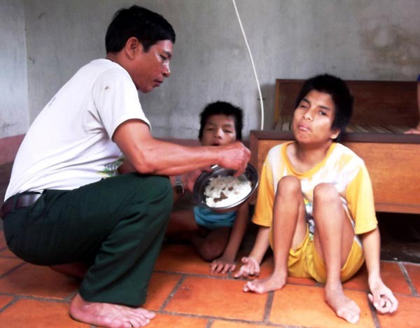 Families of Agent Orange victims live in poor condition (Photo: SGGP)